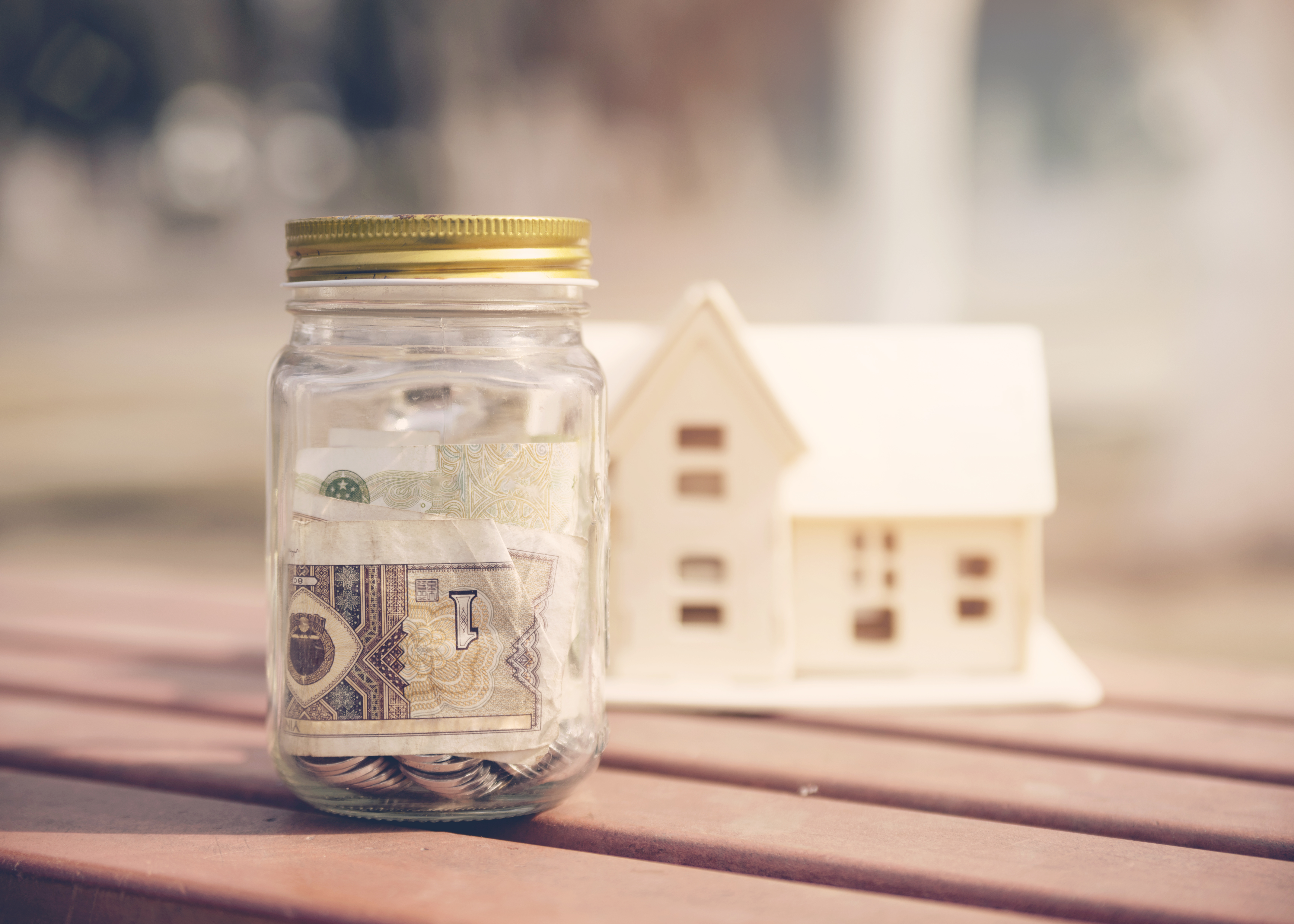 savings-jar-with-house-miniature